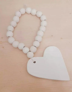 Beads with ceramic heart