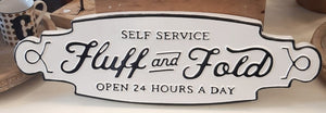 Fluff and Fold Laundry sign